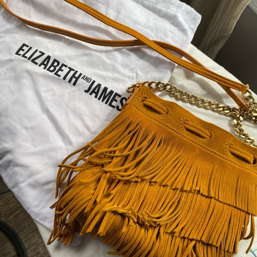 Elizabeth and James fringe Crossbody bag, mustard yellow color w dust bag $345
